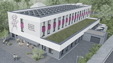 Hotel mit Gründach aus der Vogelperspektive